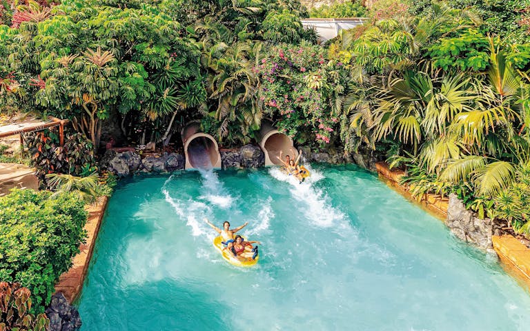 Mai Thai River lazy river at Siam Park Tenerife with tropical scenery